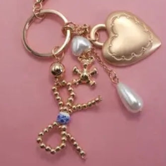Porcelain Bow And Pearl Bag Charm