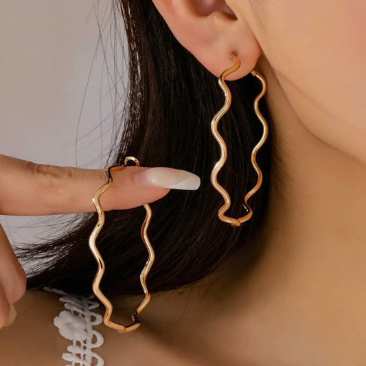 Oversized Hammered Gold Wavy Hoop Earrings