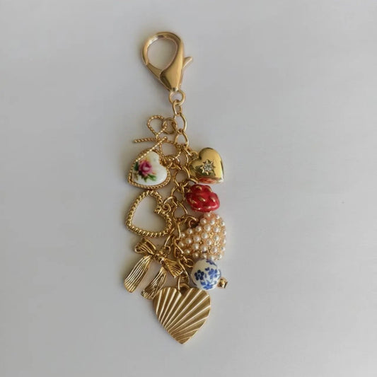 Porcelain Bows And Strawberry Bag Charm